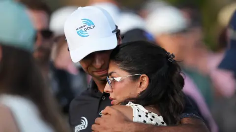 James Lang-Imagn Images Aaron Rai reacts with his wife, Gaurika Bishnoi on the 18th hole during the final round of the PGA Championship golf tournament.