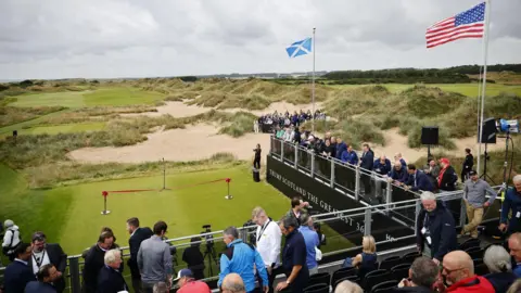 PA Media Guests wait ahead of the opening ceremony of the Trump International Golf Links which will be attended by President Donald J. Trump in Balmedie, Scotland, Britain, 29