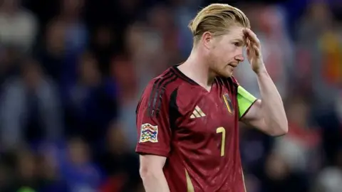 Kevin de Bruyne looks dejected after Belgium's defeat by France