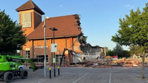 Shops Greggs, cardfactory, Mountain Warehouse and Claire's, which were destroyed in the fire at Thurmaston Shopping Centre on Saturday 20 June, have been demolished.