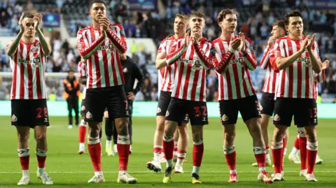 Sunderland players applaud the away fans at Coventry City