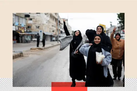 Reuters A treated image showing a group of women and girls welcoming the people coming back to Tyre 