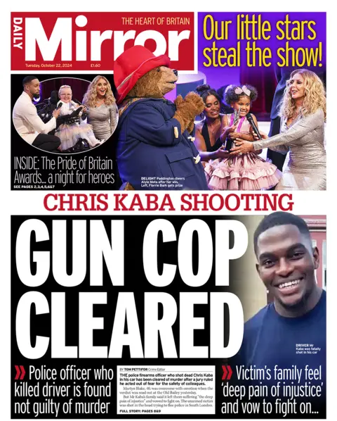 The headline in the Mirror reads: "Gun cop cleared".