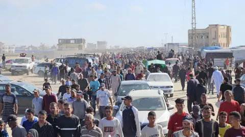 Thousands of Palestinians cause a stampede at a humanitarian aid distribution point controlled by the 'Gaza Humanitarian Foundation' in southern Gaza, on May 27, 2025.