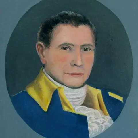 Jeri Hamel/Robert R Madision A painting of a man with slicked-back hair wearing an 18th Century blue military uniform with a white ruff.