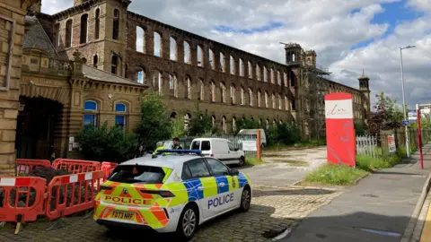 A police car parked outside 