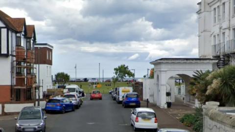 General view of Steartfield Road looking down middle of street towards sea 