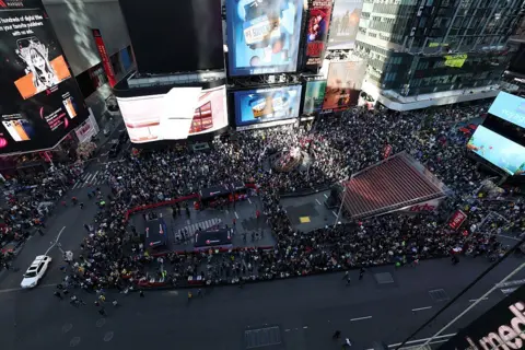 Getty Images An aerial shot of Times Square showing large crowds of protesters