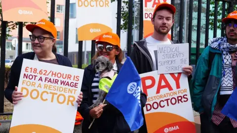 NHS resident doctors protest outside Royal Victoria Infirmary in Newcastle, on 25 July 2025