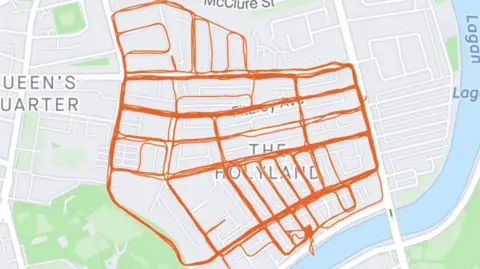 Strava A map showing the route of a run with orange lines down streets around the Holyland area of Belfast. 