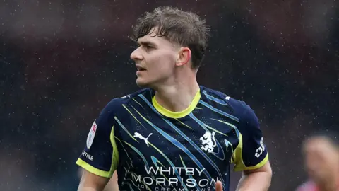 Alfie Pond in action for Crewe