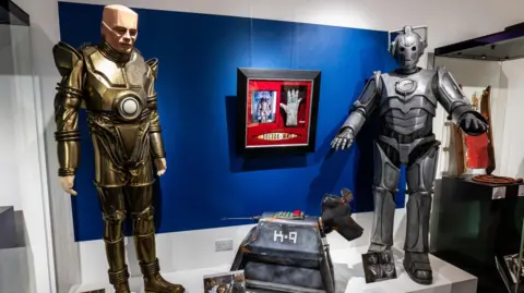 Heritage Auctions A model of Kryten, a character from the TV sitcom Red Dwarf, as well as K9 and a Cyberman from Doctor Who.