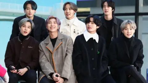 (left to right) Jimin, Jungkook, RM, J-Hope, V, Jin, and SUGA of the K-pop boy band BTS visit the "Today" Show at Rockefeller Plaza in 2020