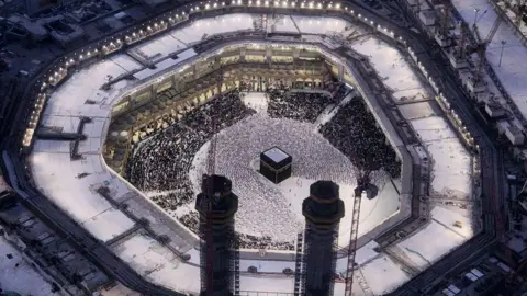Getty Images An aerial view of the Kaaba, Islam's holiest site located in the center of the Masjid al-Haram (Grand Mosque) in Mecca, Saudi Arabia, visited by millions of Muslims every year for pilgrimage and Umrah
