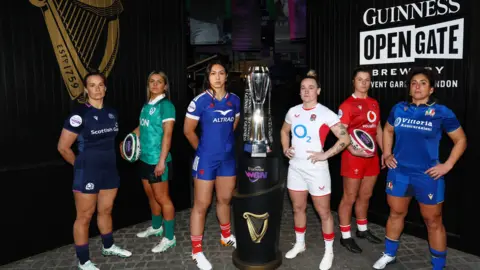 Official launch of 2026 Women's Six Nations - Guinness Open Gate Brewery, London, Britain - March 25, 2026
England captain Meg Jones, France captain Manae Feleu, Ireland captain Erin King, Italy Silvia Turani, Scotland captain Rachel Malcolm, Wales captain Kate Williams pose next to the Six Nations trophy Action Images via Reuters/Matthew Childs