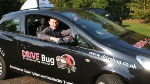 Jeff Tuck Jeff Tuck sitting in his Drive Bug car