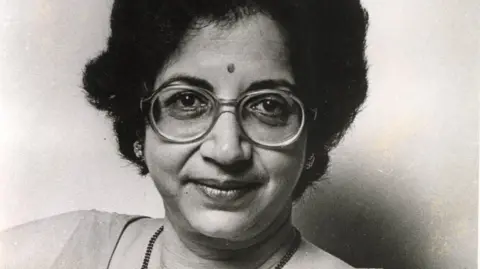 A black-and-white photo of Vijaya Mehta