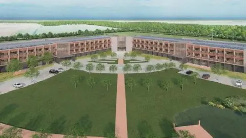An artists impression of Doncaster City Elite Training Centre, taken from the planning document. It depicts a large green area, with trees in the foreground with a peach coloured pathway through the centre, and car parking at either side. At the apex of the image is a hotel like structure in four, wide. three storey blocks, edged with trees.
