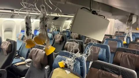 Reuters Interior of the plane after the emergency landing