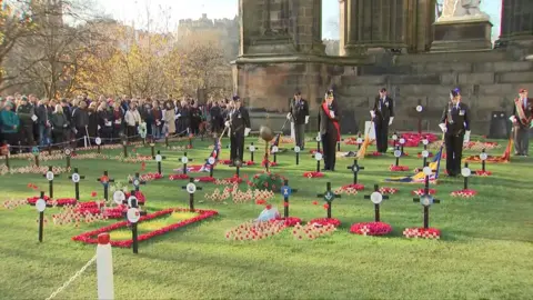 Armistice Day scene in Edinburgh Gardens of Remembrance