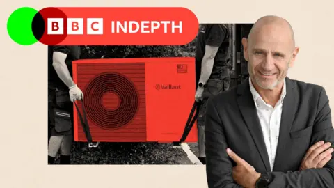 A treated image of two men on either side holding a heat pump