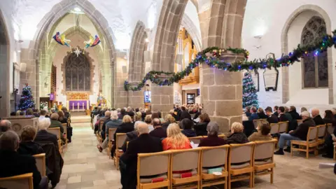 Jon Guegan A photo of the service