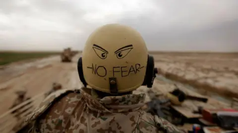 Getty Images  A Danish Leopard tank loader sits on his tank as he guards US army soldiers with Thorn Task Force, marines with 1/3 Charlie Company and British army soldiers with A Squadron, Household Cavalry Regiment as they clear clear Improvised Explosive Devices (IED)s from a main route in Trikh Nawar on the North Eastern outskirts of Marjah on February 21, 2010