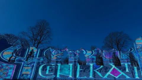 Created by Luxmuralis A light show projected onto medieval ruins in a range of colours