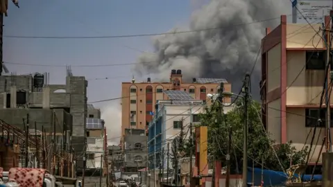 Smoke rises after apparent Israeli strike in central Gaza