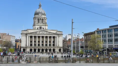 A general view of Nottingham Town Hall in Market Square on a sunny day