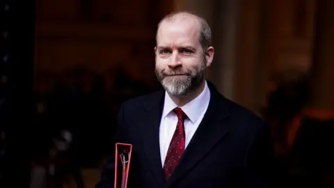 Sekretaris Bisnis Media PA Jonathan Reynolds tiba di Downing Street, London, untuk pertemuan kabinet.