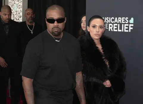 Getty Images Kanye West and Bianca Censori on the red carpet