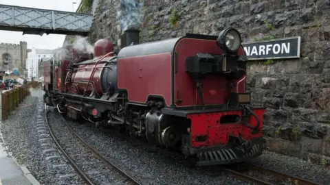 Getty Images A red steam train in Caernarfon