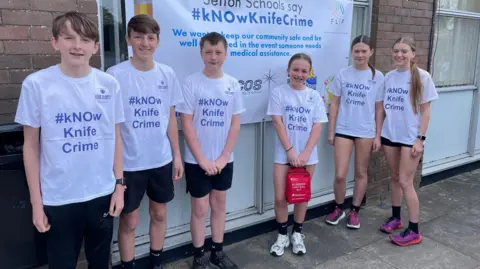 BBC School children wearing Know Knife Crime t-shirts
