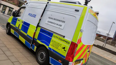 GMP Facial recognition van parked on pavement. 
