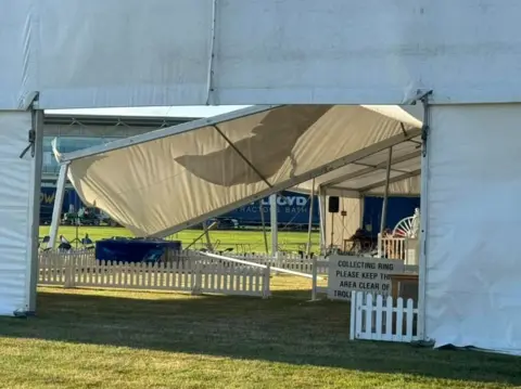 Dave Chapman The frames and tent of a marquee fallen down due to Storm Lilian winds