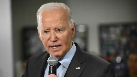 Biden is seen speaking to a crowd.