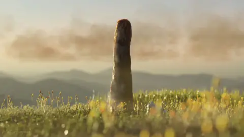 Matt Humpage An image of how Prototaxites might have looked - a tall organism towering over low grasses around it