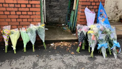 Floral tributes at the roadside