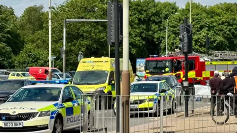 The scene of a crash, with all three emergency services in attendance
