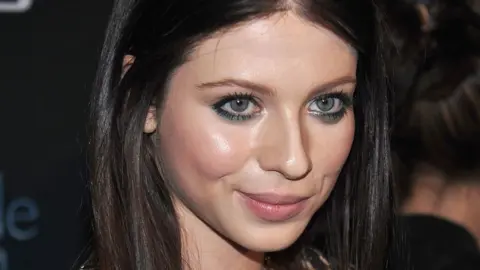 Michelle Trachtenberg attends The Darker Side of Green debate series moderated by Tracey Morgan at The Bowery Hotel on July 27, 2010 in New York City.