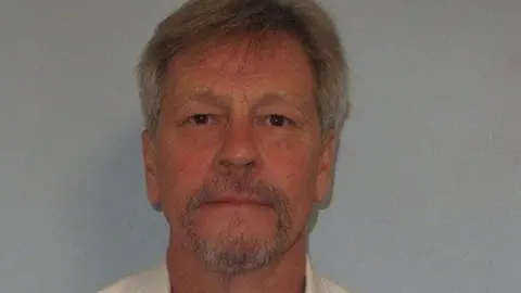 Metropolitan Police A custody photo of Patrick Adams, who has blonde hair, a beard and is facing the camera.