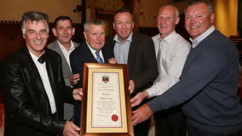 Derry and Strabane Council Jim McLaughlin with players from the treble winning Derry City team, Felix Healy, Paul "Storky" Carlyle, Liam Coyle, Paul Hegarty and Jack Keay