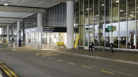 Geograph A general view from an arrival section at Manchester Airport's Terminal 2, showing a road arrival area and some large automatic doors