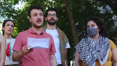 Mahmoud Khalil speaks at a pro-Palestinian protest