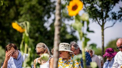  Relatives of the MH17 victims at the 10th commemoration of MH17 flight disaster at the National MH17 monument on July 17, 2024 in Vijfhuizen, Netherlands