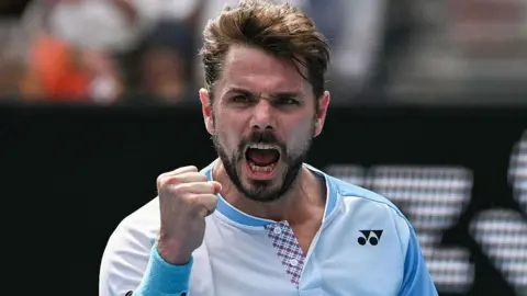 Stan Wawrinka pumps his first in celebration