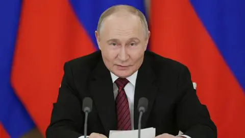 Sputnik / Getty Images Russia's President Vladimir Putin addresses the media following his meetings with foreign leaders in Moscow