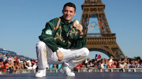 Rhys McClenaghan with his Olympic medal in Paris 