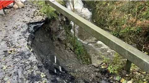 Crumbling wall above A470